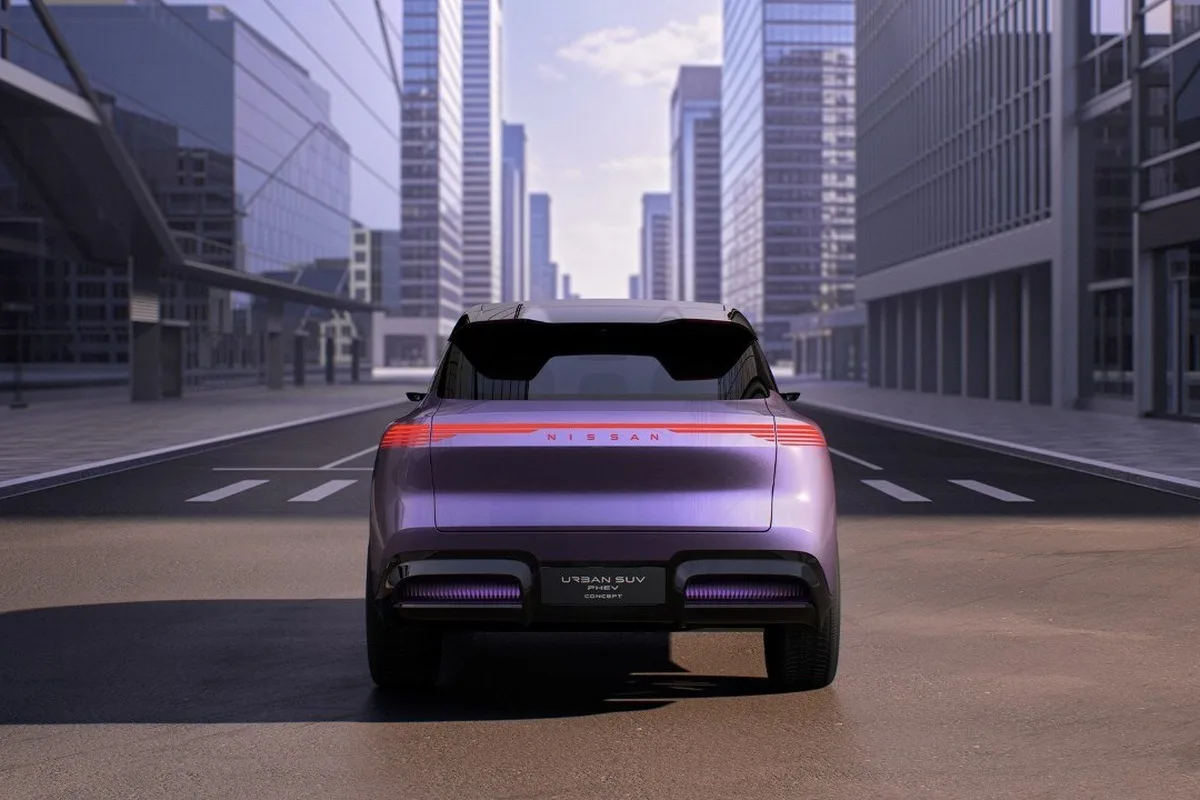 Nissan Urban SUV Concept rear view centered on a city street