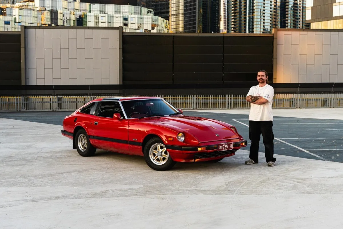 Red Nissan 280ZX with owner