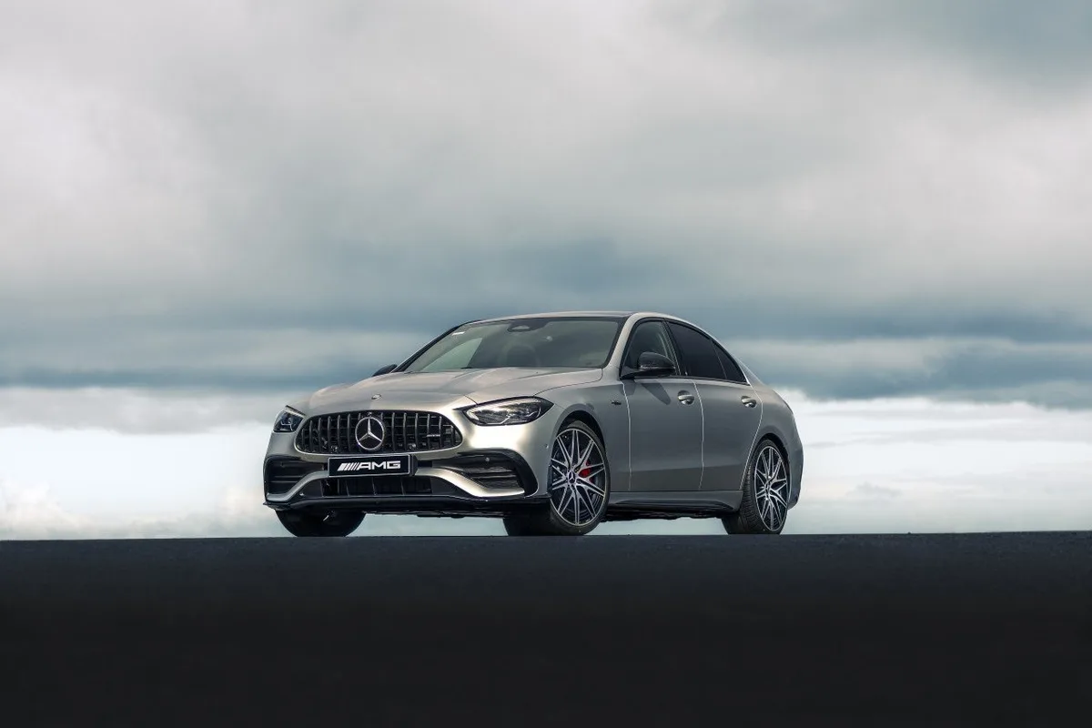 Mercedes-AMG C 43 Edition R+ silver sedan front three-quarter view with black AMG grille and red brake callipers