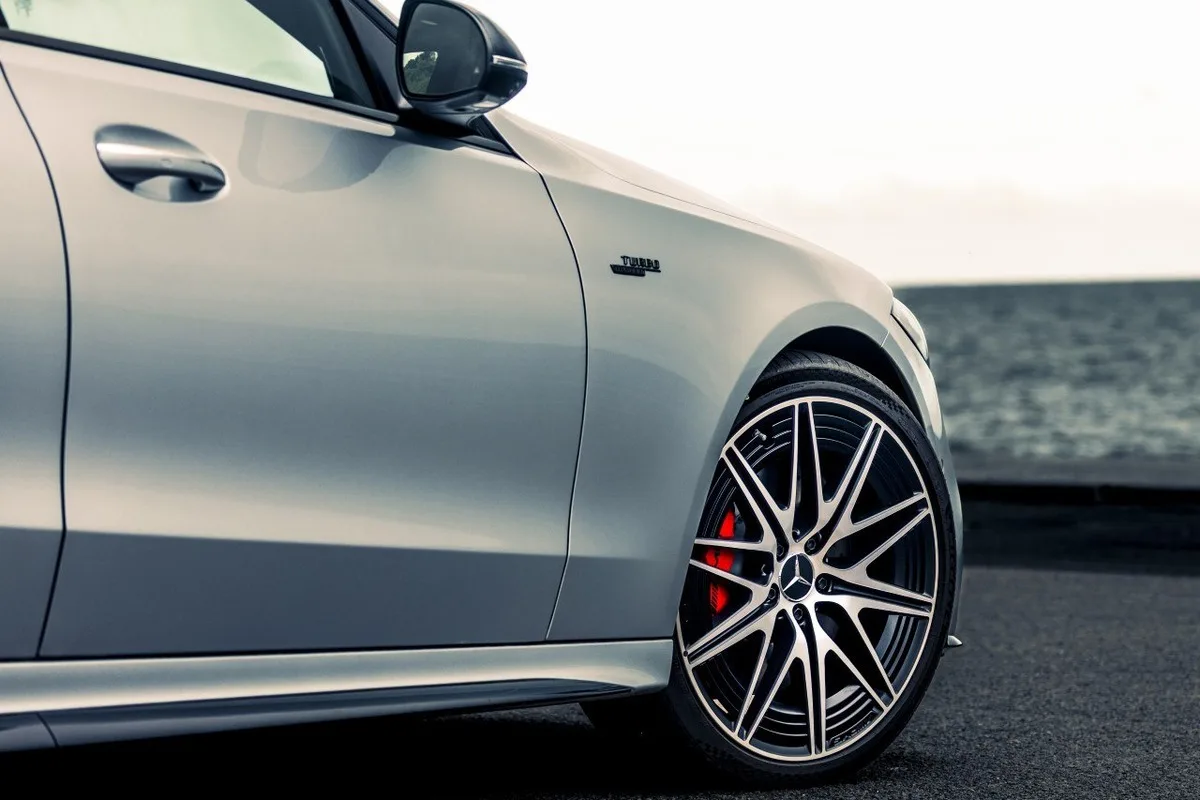 Mercedes-AMG C 43 Edition R+ front wheel detail with Turbo 4MATIC badge and red brake calliper