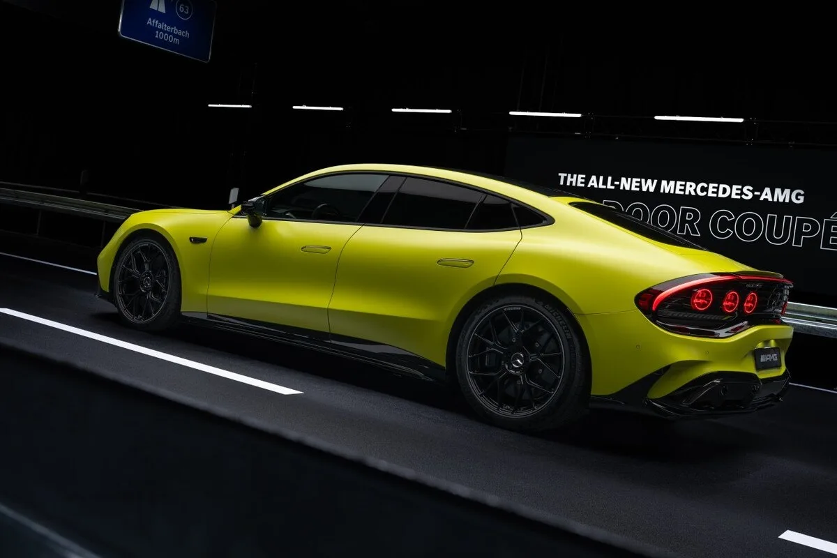 2026 Mercedes-AMG GT 4-Door Coupe EV side profile showing long fastback body