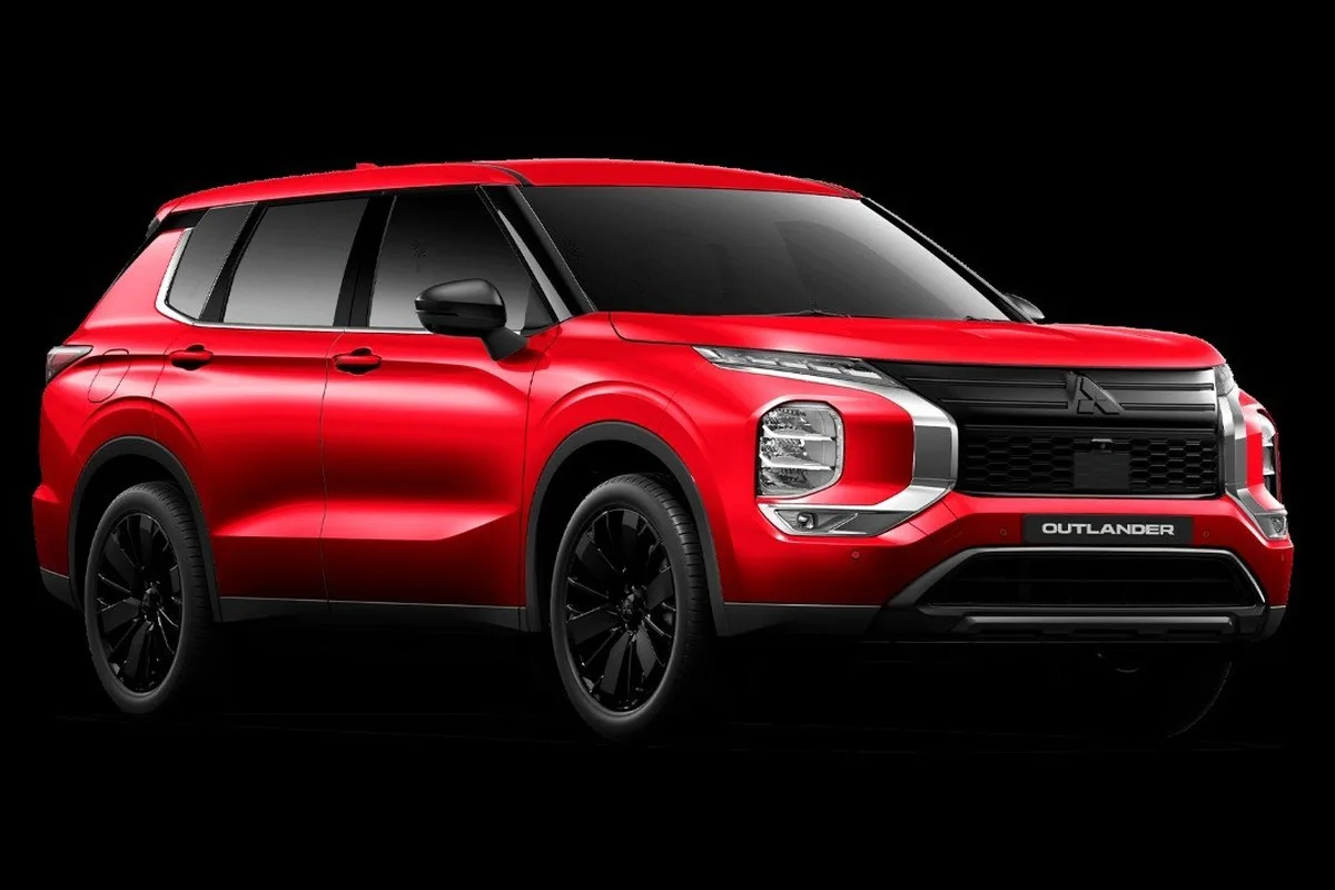 2026 Mitsubishi Outlander Black Edition in red from the front three-quarter studio view