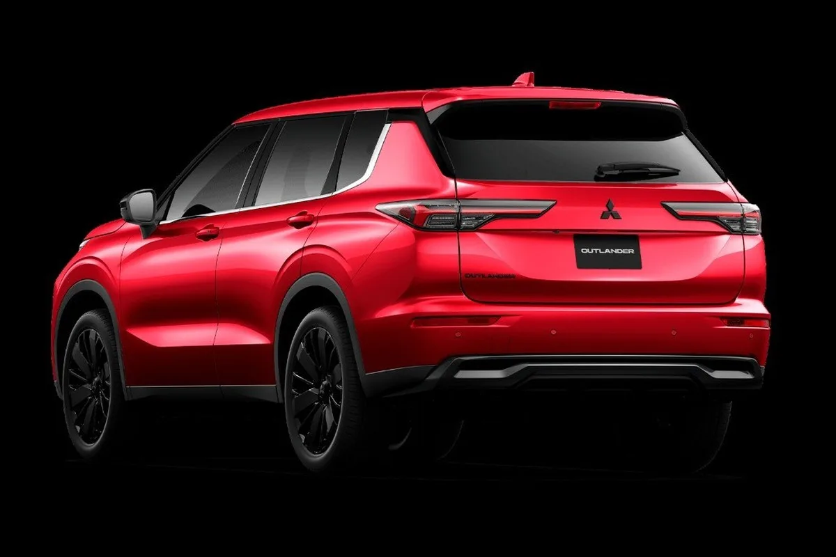 2026 Mitsubishi Outlander Black Edition in red from the rear three-quarter studio view