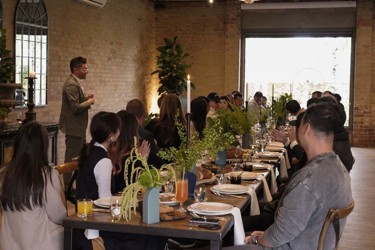 Guests attend a House of DENZA dining event