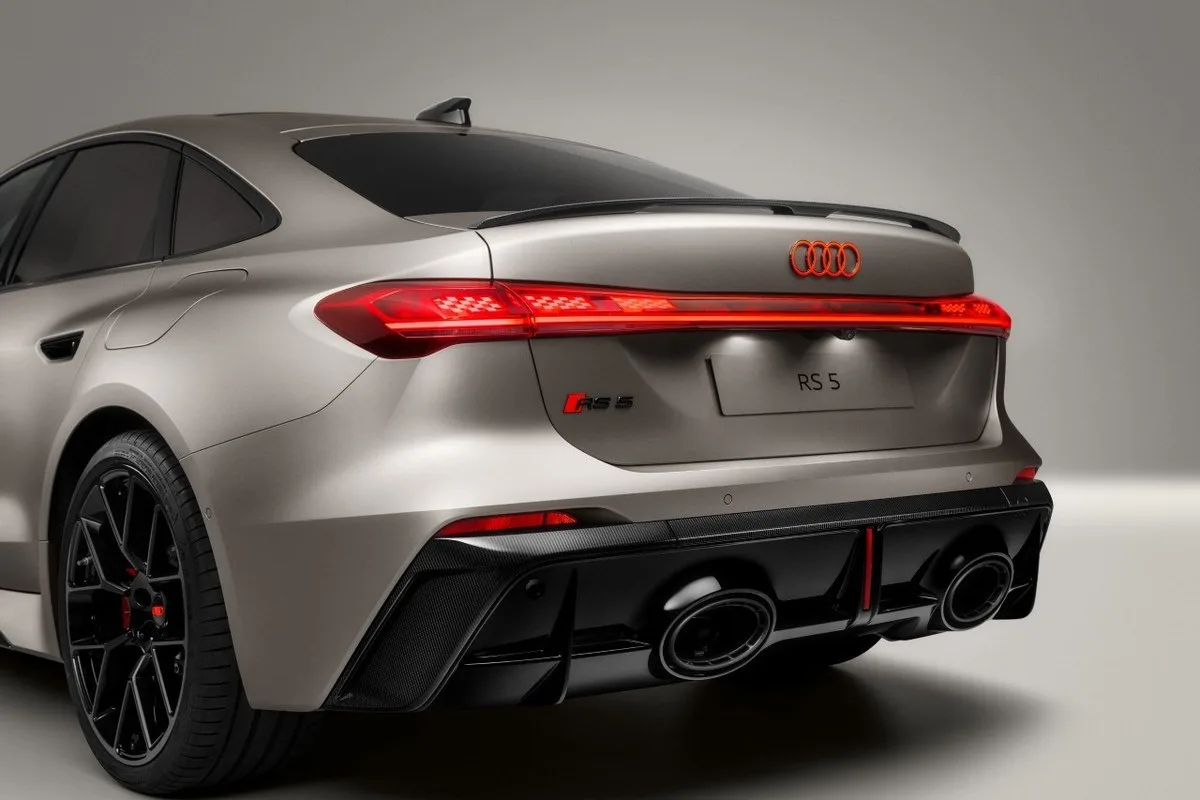 Audi RS 5 rear three-quarter view with full-width rear light bar