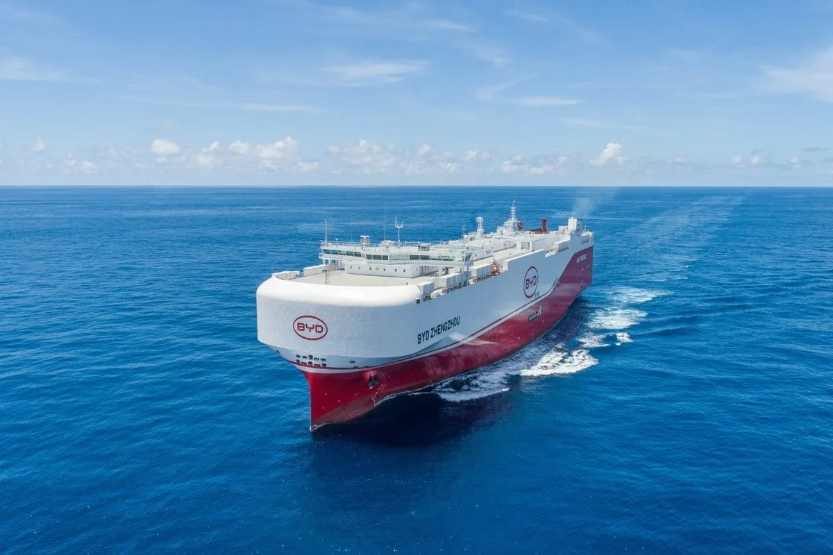 Aerial view of the BYD Zhengzhou vehicle carrier sailing on open blue ocean