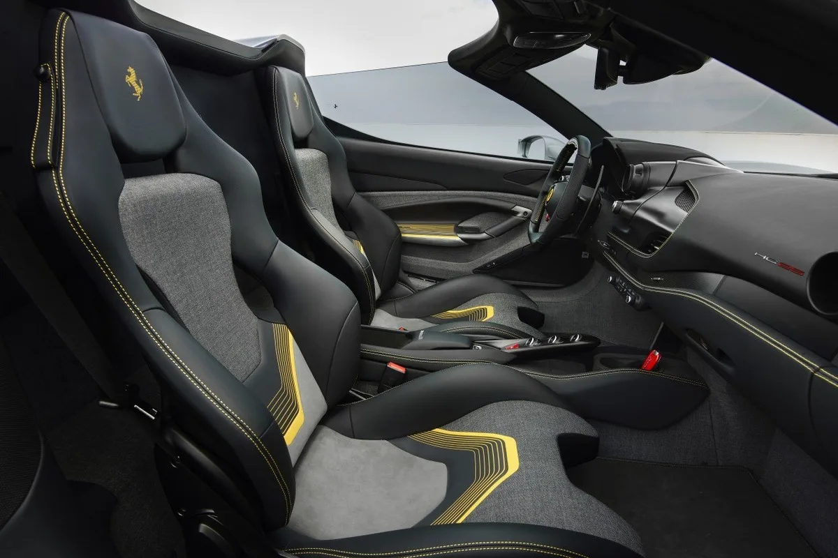 Ferrari HC25 One-Off cabin with bucket seats, Ferrari badging and yellow contrast stitching.