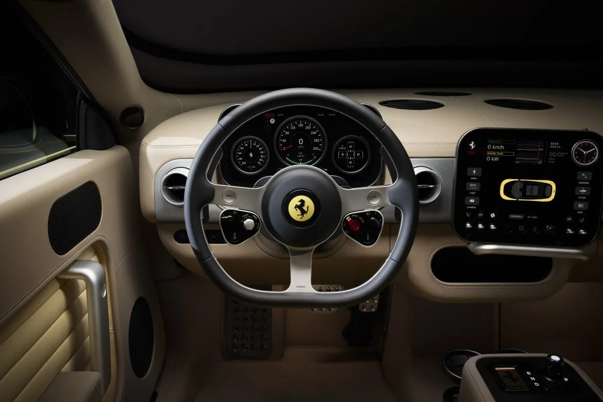 Ferrari Luce beige cabin with steering wheel, analogue gauges and central touchscreen