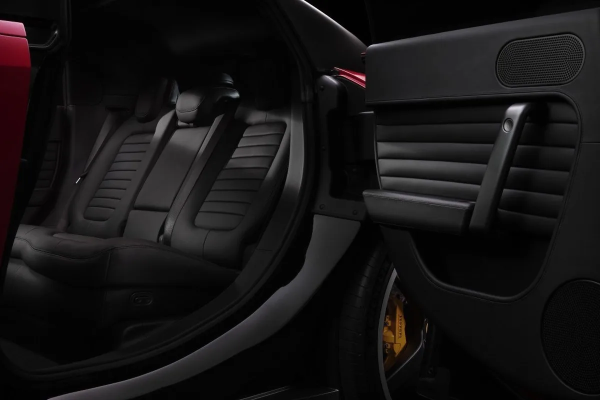 Ferrari Luce rear seating area with black leather and open rear door
