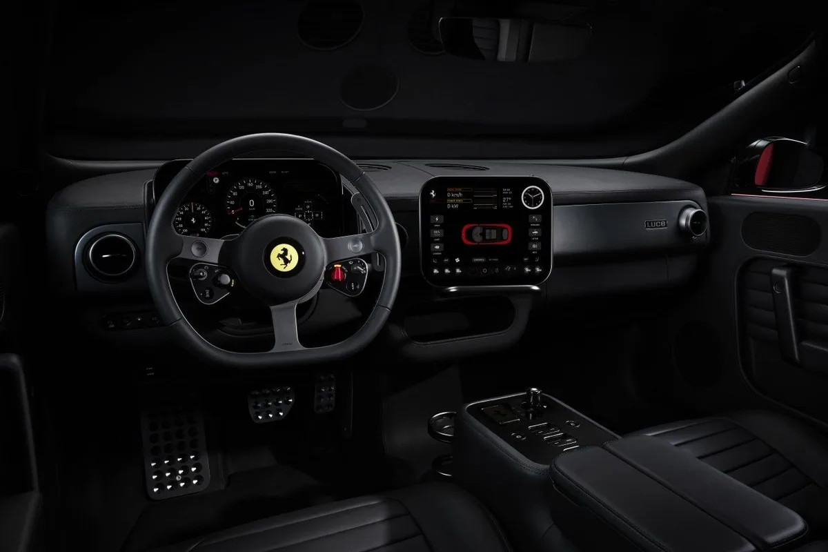 Ferrari Luce black interior showing dashboard, roof, touchscreen and front seats
