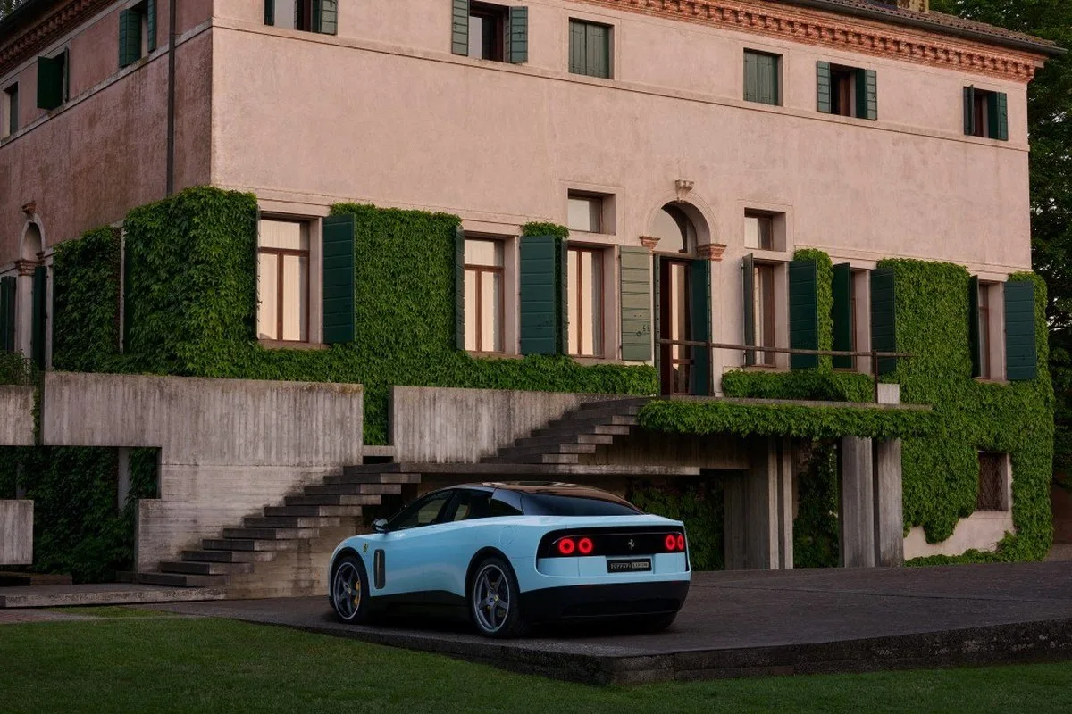 Ferrari Luce rear three-quarter view outside a villa with circular tail lights
