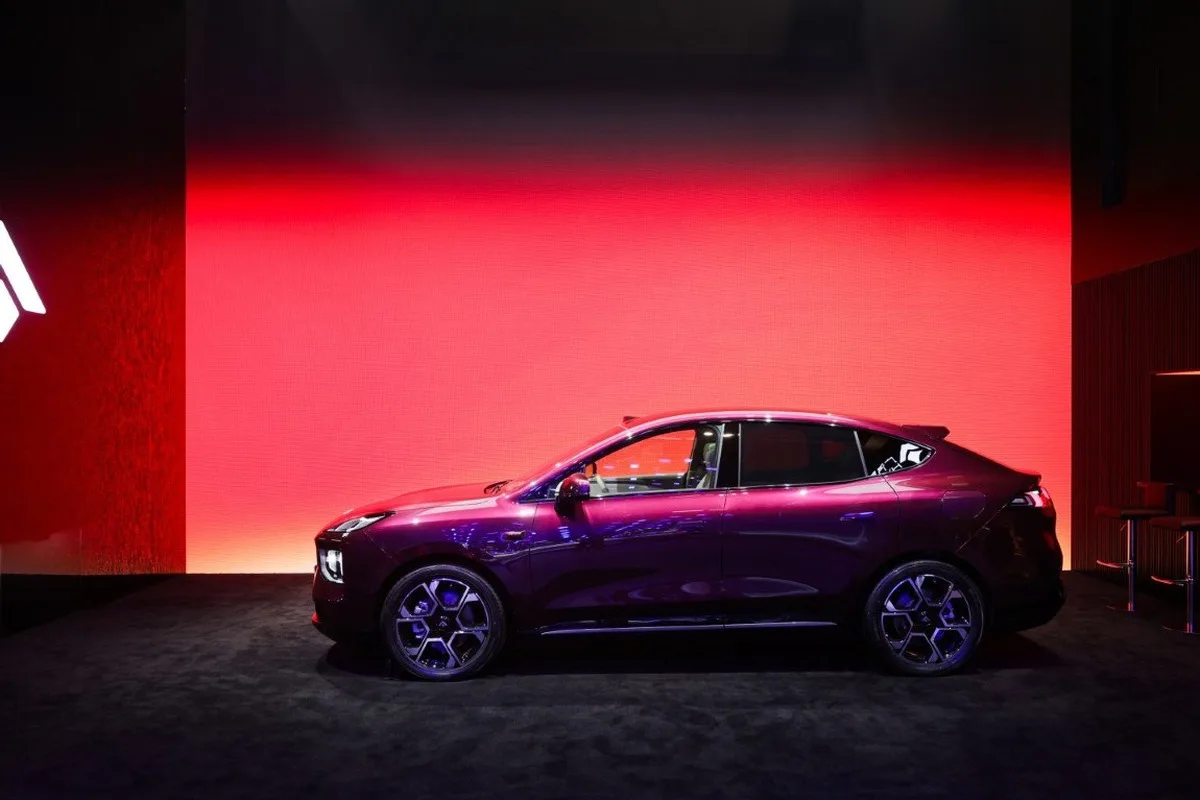 Burgundy Hyptec S600 coupe SUV shown in side profile on the GAC stand