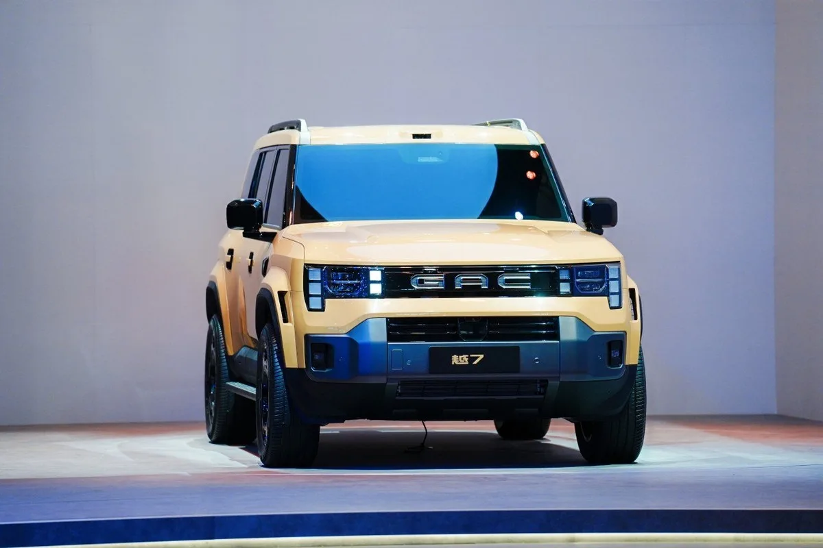 Boxy yellow GAC YUE7 SUV displayed on stage at Auto China 2026
