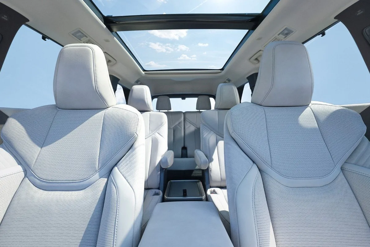 Lexus TZ three-row cabin with captain chairs and panoramic roof.
