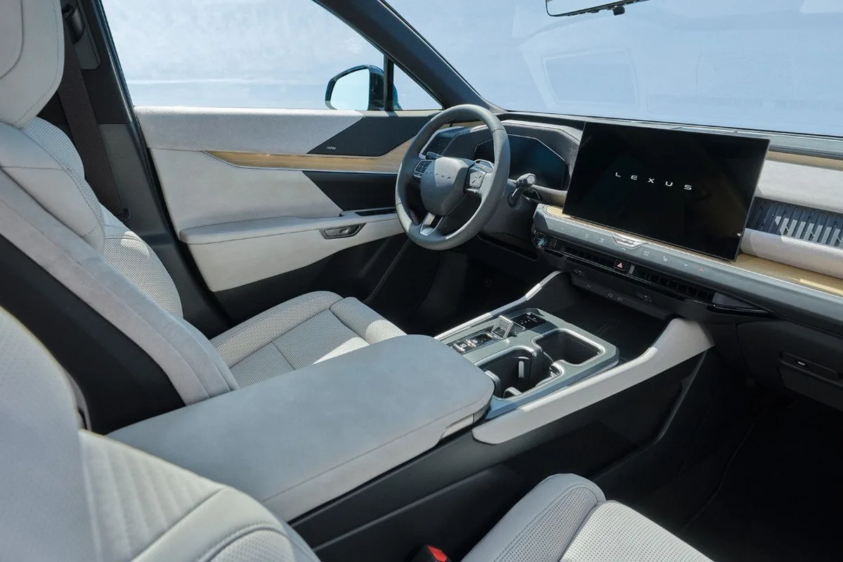 Lexus TZ front cabin with Lexus display, light trim and centre console.