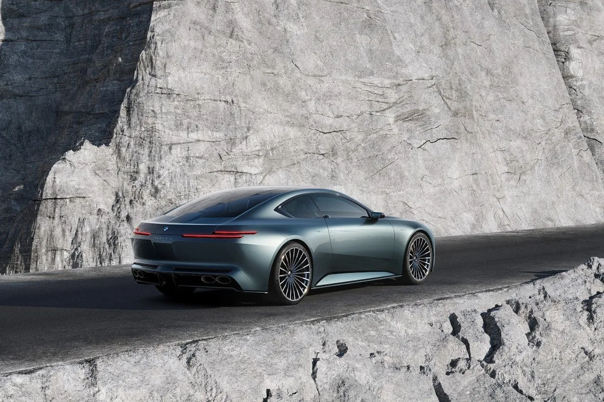 Vision BMW ALPINA coupe on a mountain road from the rear.