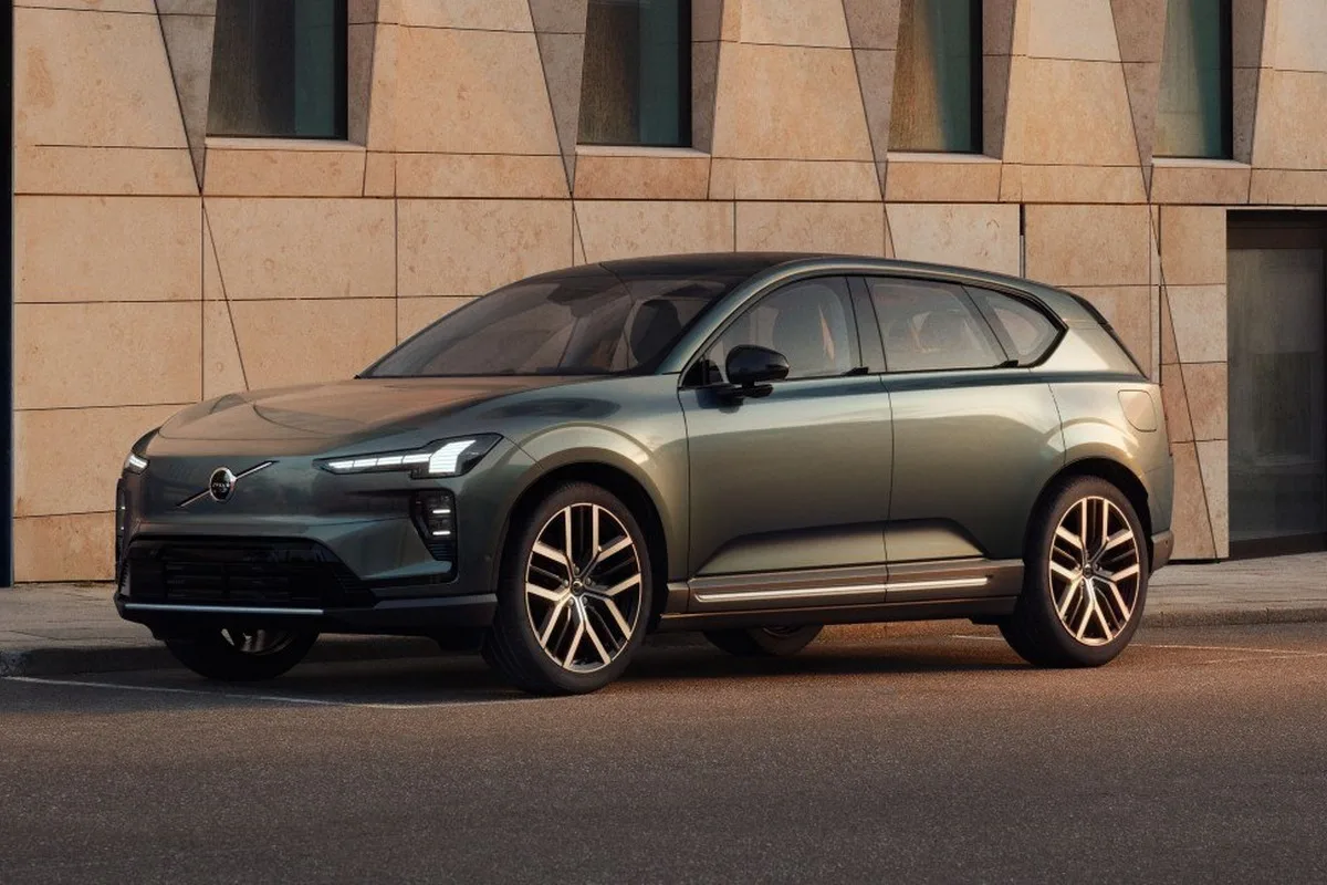 Volvo electric SUV parked on a city street in a front three-quarter view.