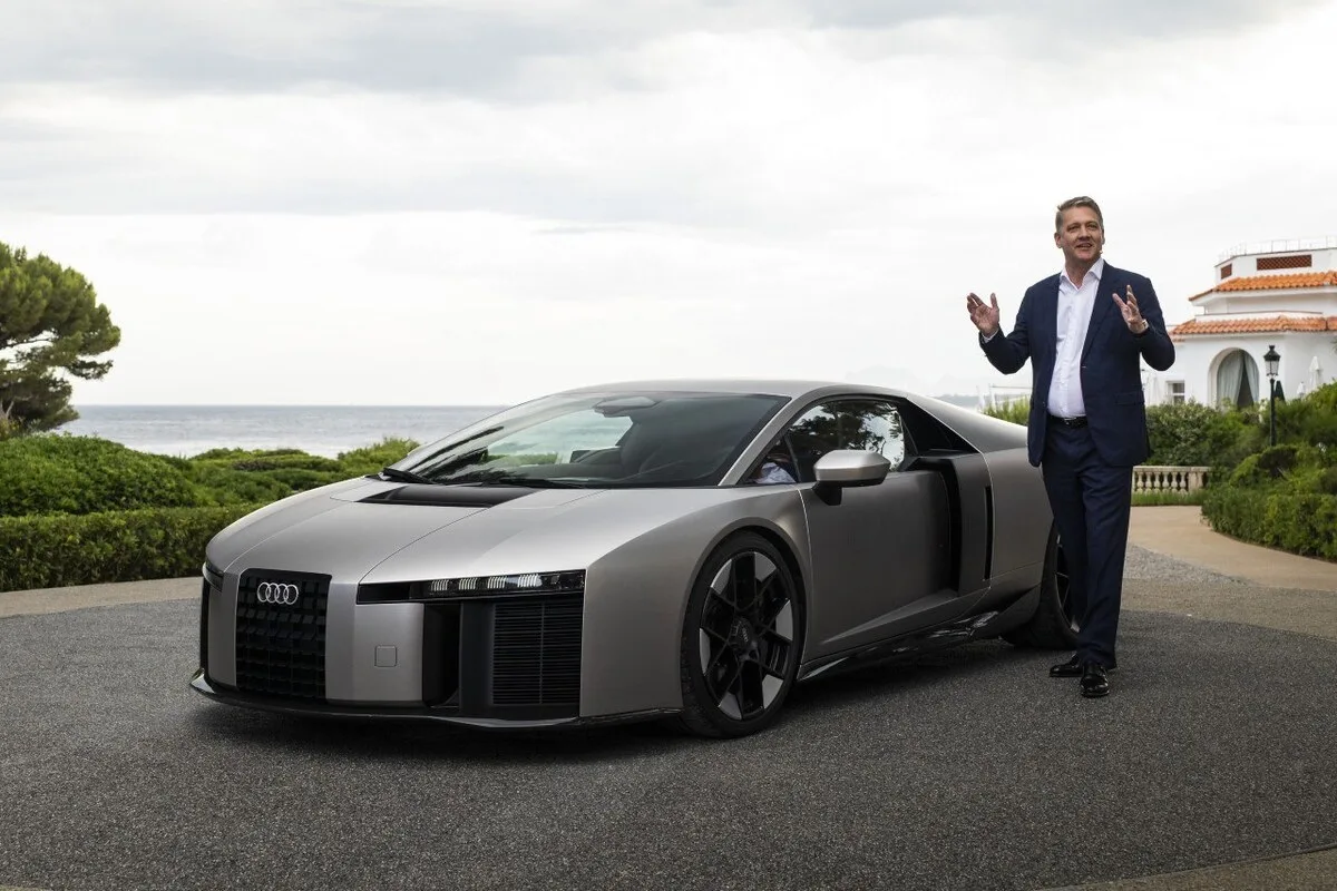 Audi Nuvolari hypercar presented by an Audi executive at the launch event