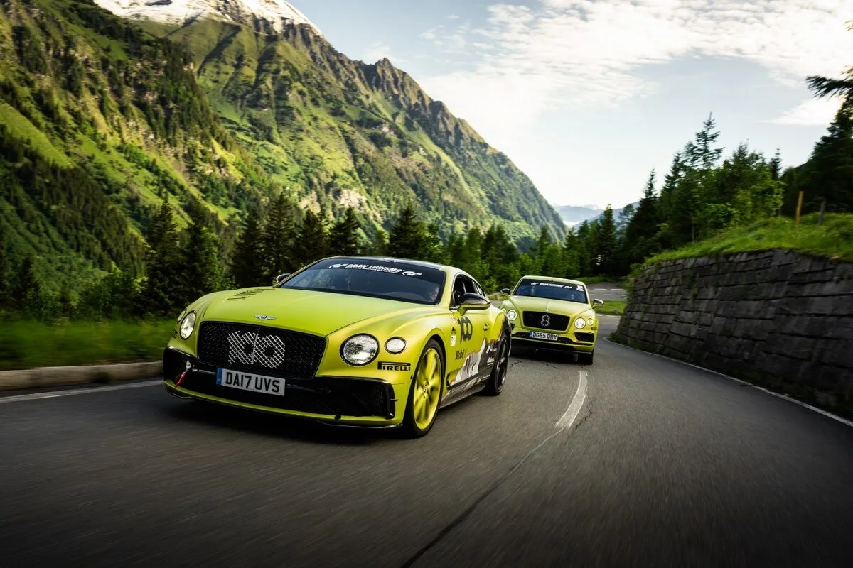 Bentley Pikes Peak Continental GT and Bentayga driving through an alpine road