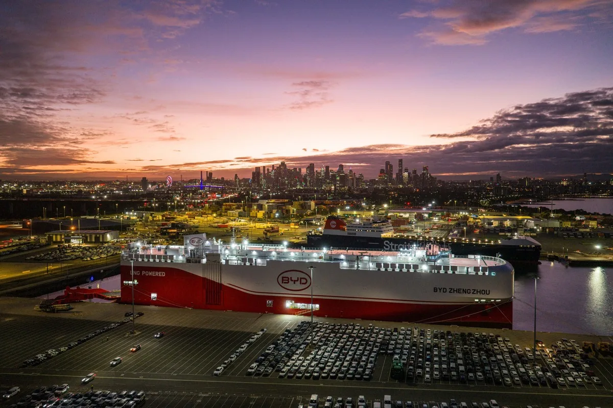 BYD Zhengzhou vehicle carrier docked at the Port of Melbourne at dusk