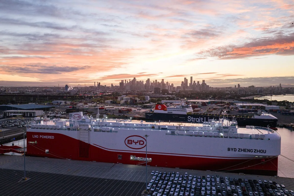 BYD Zhengzhou docked in Melbourne with rows of new vehicles waiting on the wharf