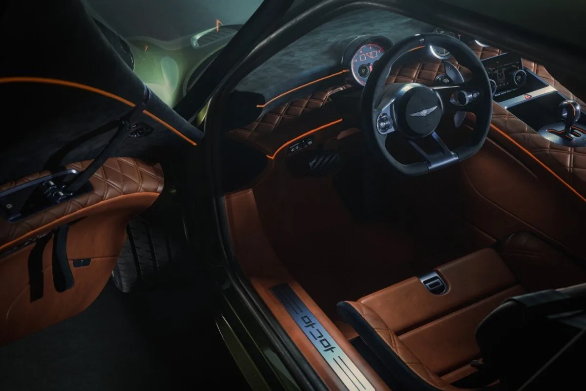 Genesis Magma GT Concept cabin viewed through an open door with quilted leather trim