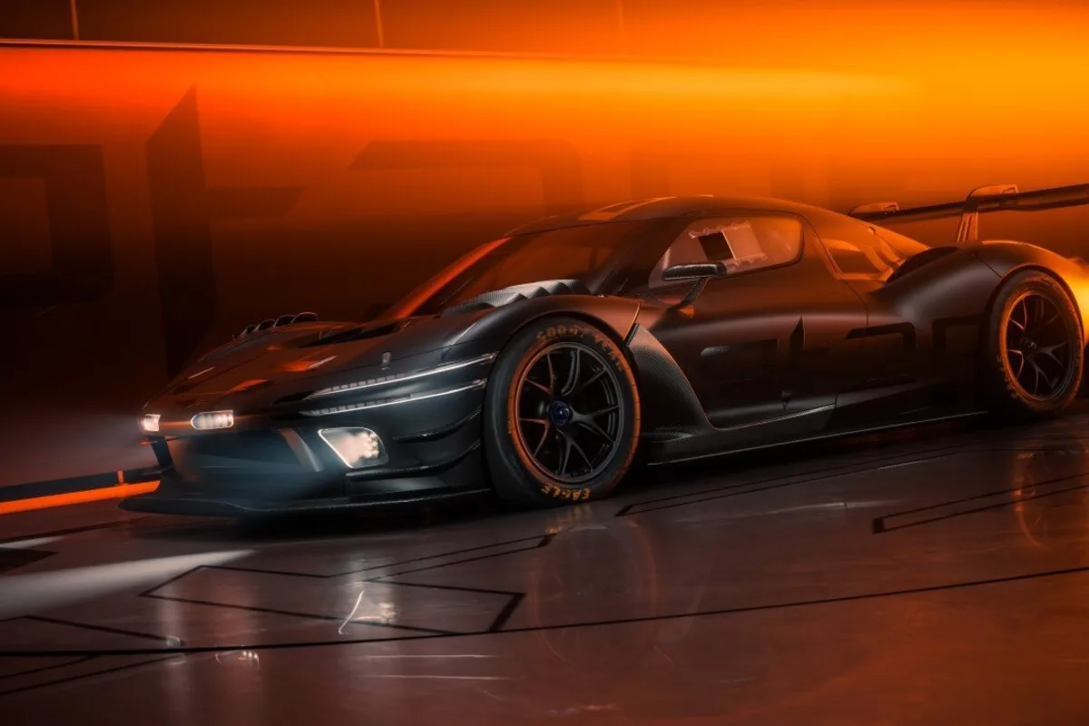 Genesis Magma GT3 Concept shown from the front three-quarter angle under orange studio lighting
