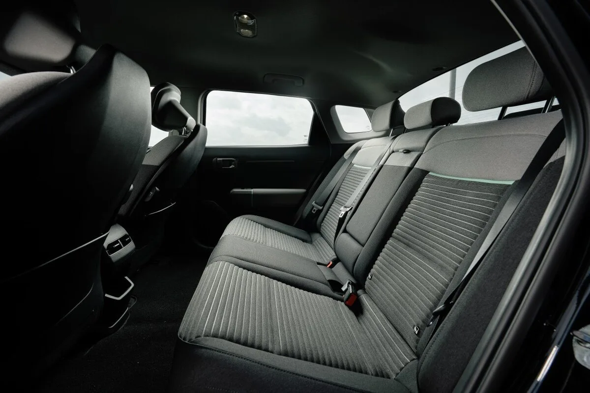 2026 Kia EV4 Earth Long Range rear seats showing cloth trim and passenger space