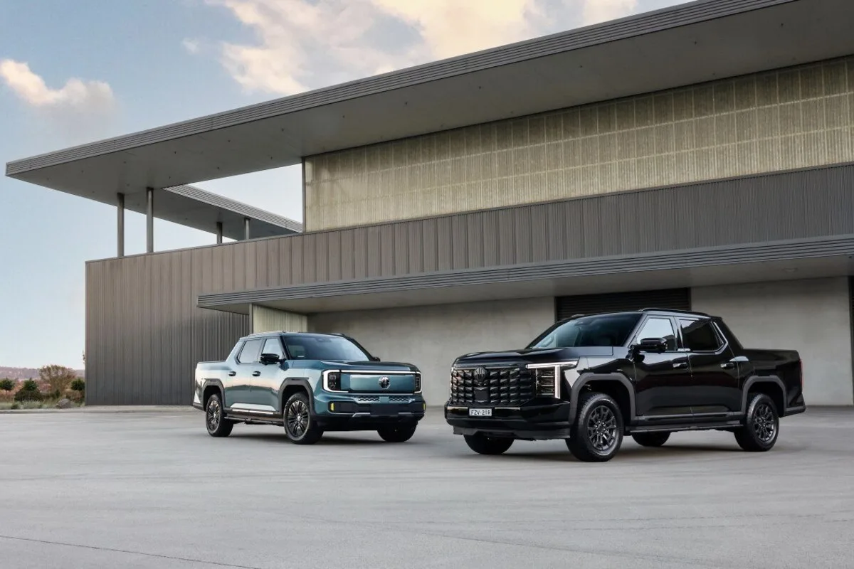 2026 MG MGU9 Black Edition beside another MGU9 ute outside a modern building