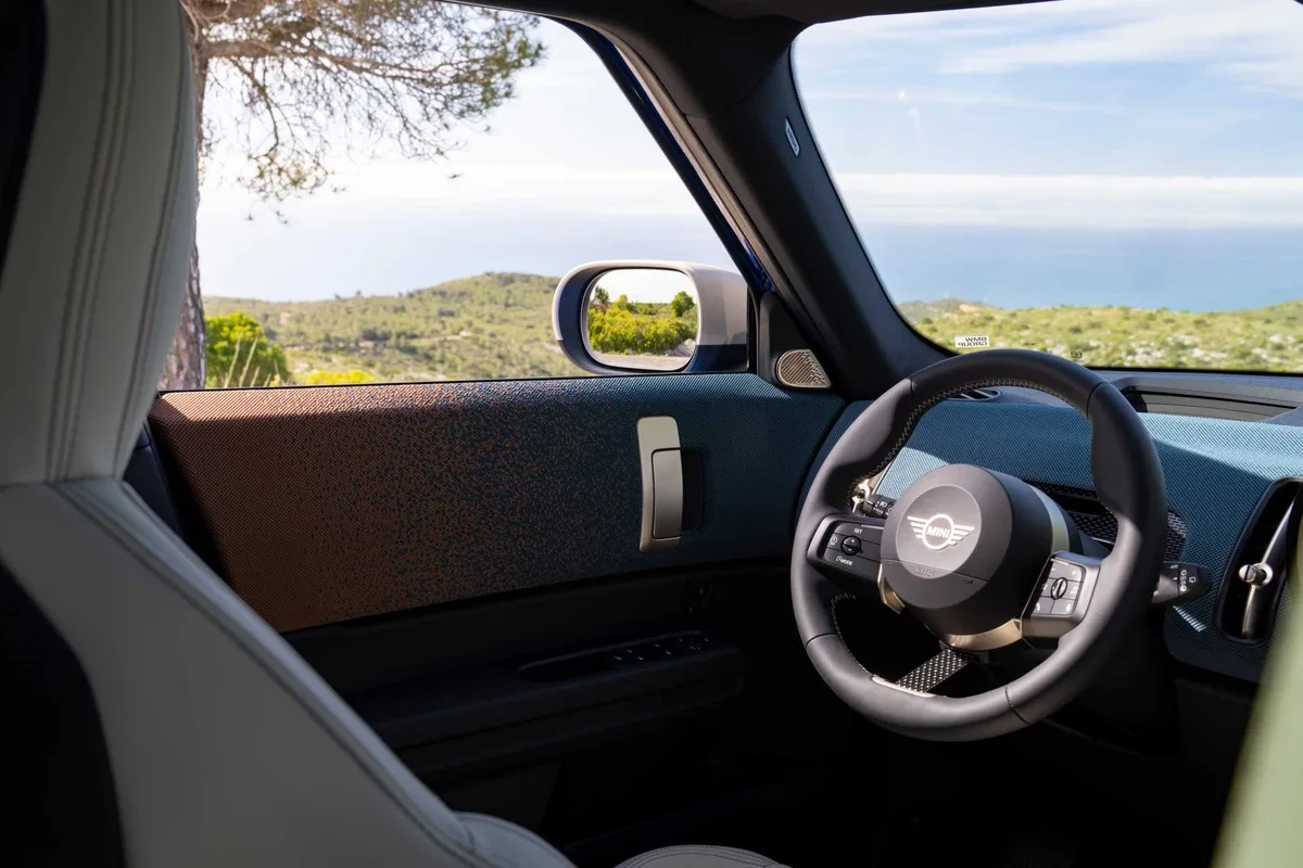 MINI Countryman E front detail showing the grille and headlight design