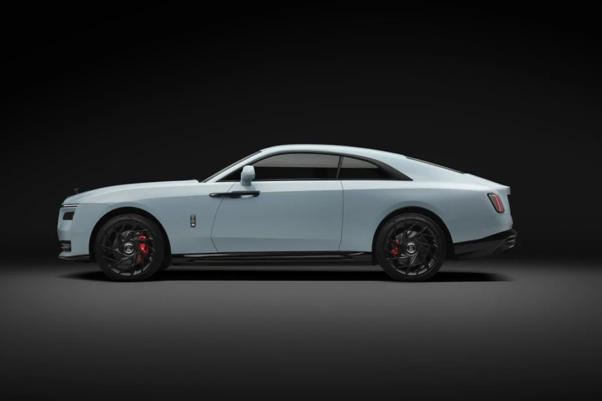 Black Badge Rolls-Royce Spectre Series II shown in side profile.