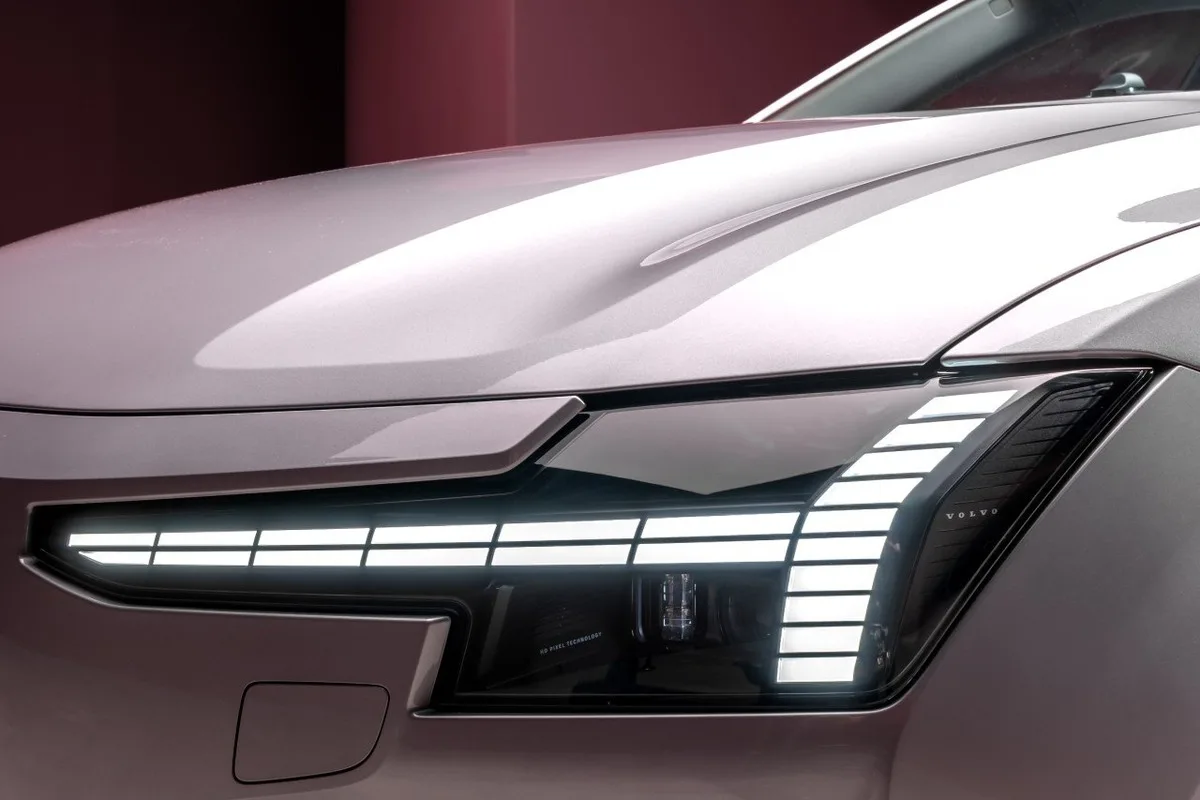 Volvo ES90 headlight detail showing the LED lighting signature