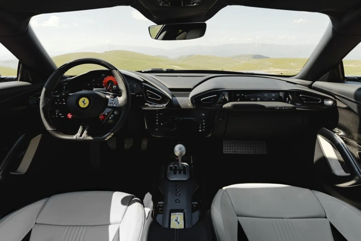 Ferrari 12Cilindri Manuale dashboard viewed from the seats with the shifter in the foreground