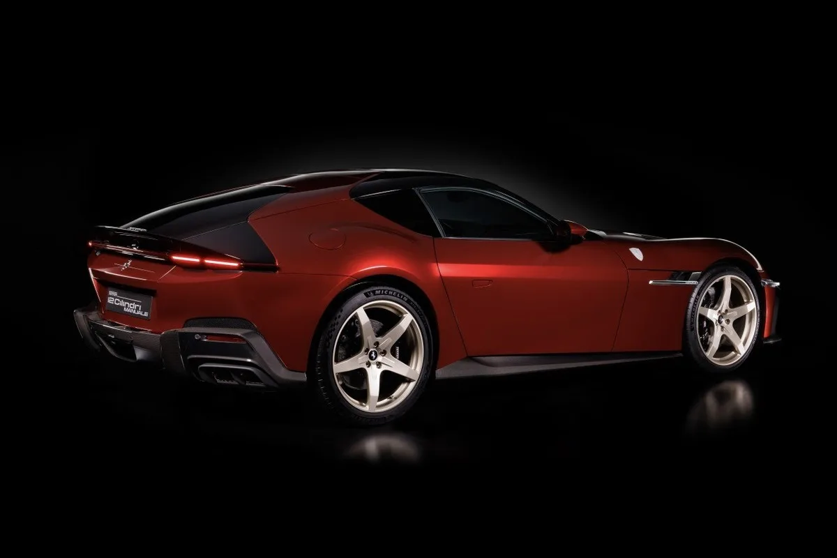 Ferrari 12Cilindri Manuale side profile in a dark studio with five-spoke wheels