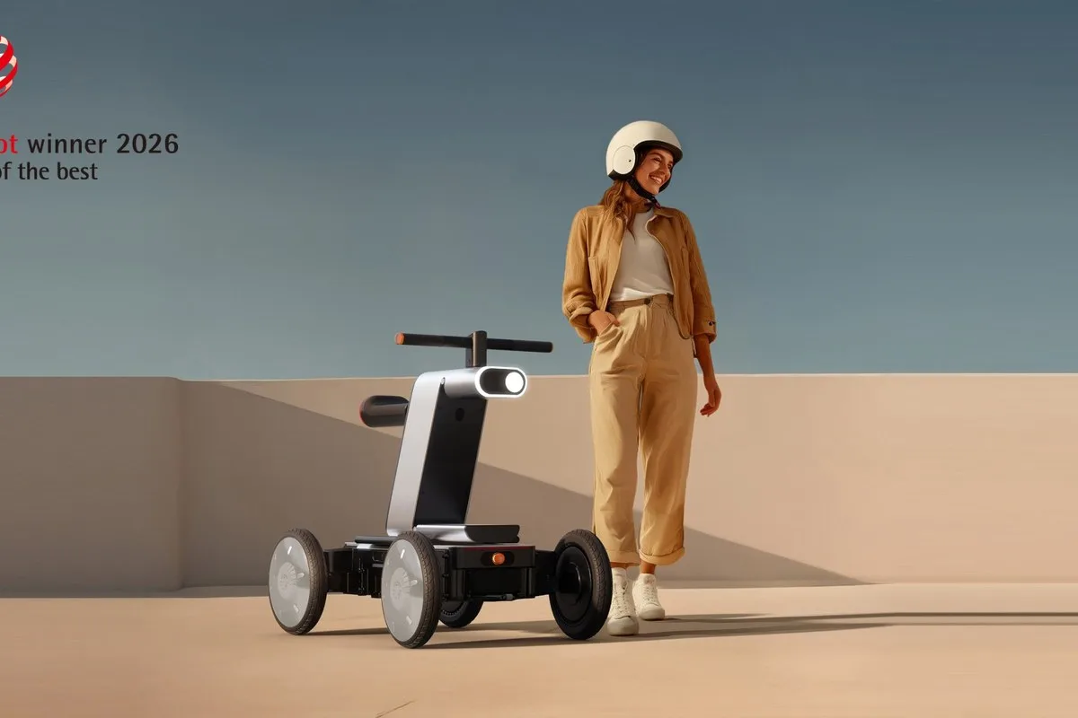 Silver Hyundai MobED Urban Hopper four-wheeled personal mobility device beside a helmeted rider