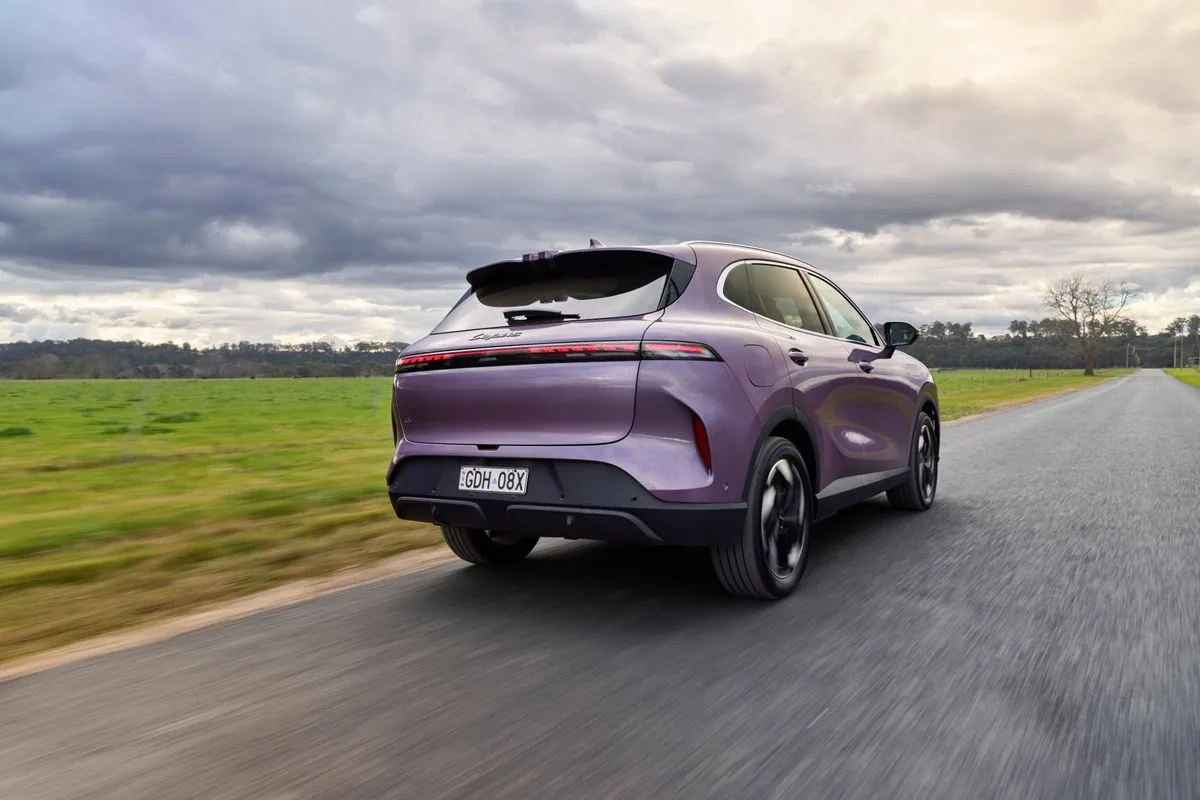 Purple Lepas L6 EV rear on a rural road