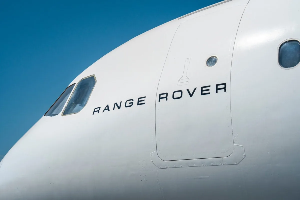 Close-up of the aeroplane nose with Range Rover branding