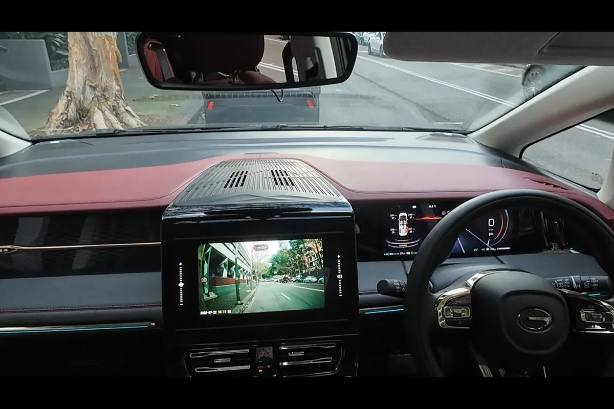 OttoSafe Cam dash cam footage on the infotainment screen of a car