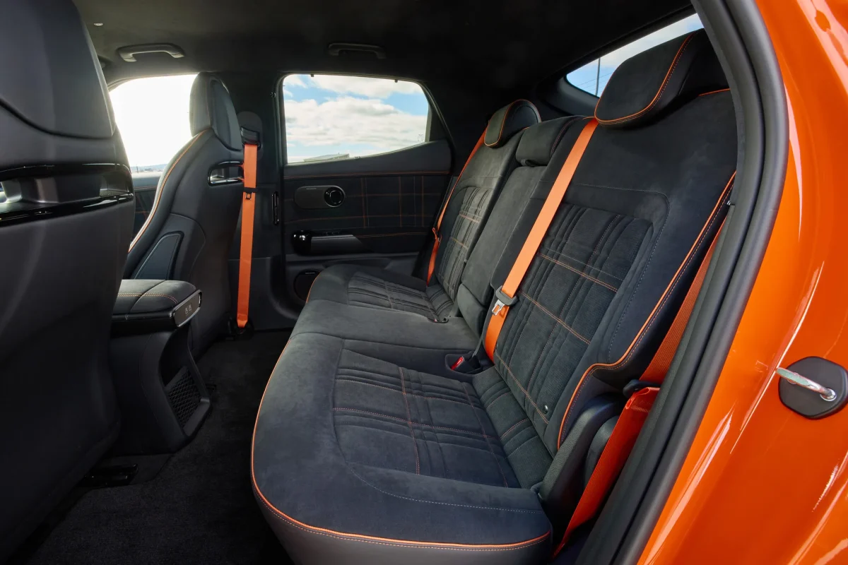 Genesis GV60 Magma rear seats trimmed in black with orange stitching