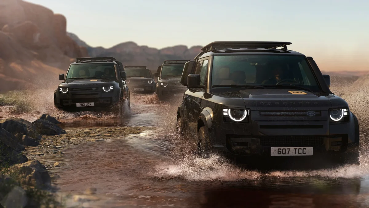 Land Rover Defender Trophy Edition convoy crossing water