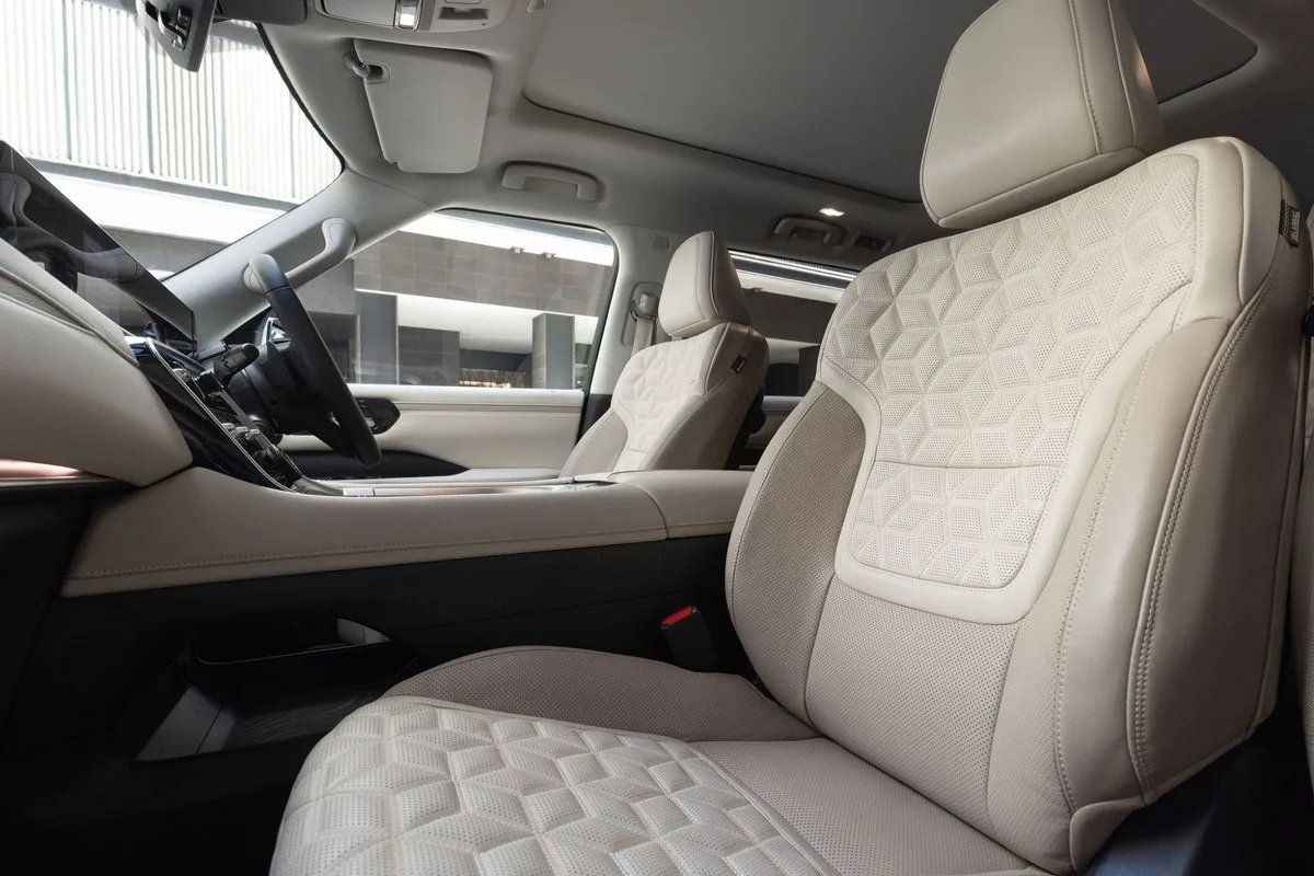 Quilted cream leather front seats in the Nissan Y63 Patrol