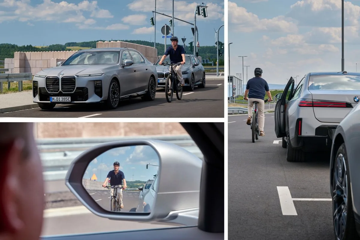 BMW 7 Series at an intersection with a cyclist alongside, the cyclist in the door mirror, and a cyclist passing an open rear door