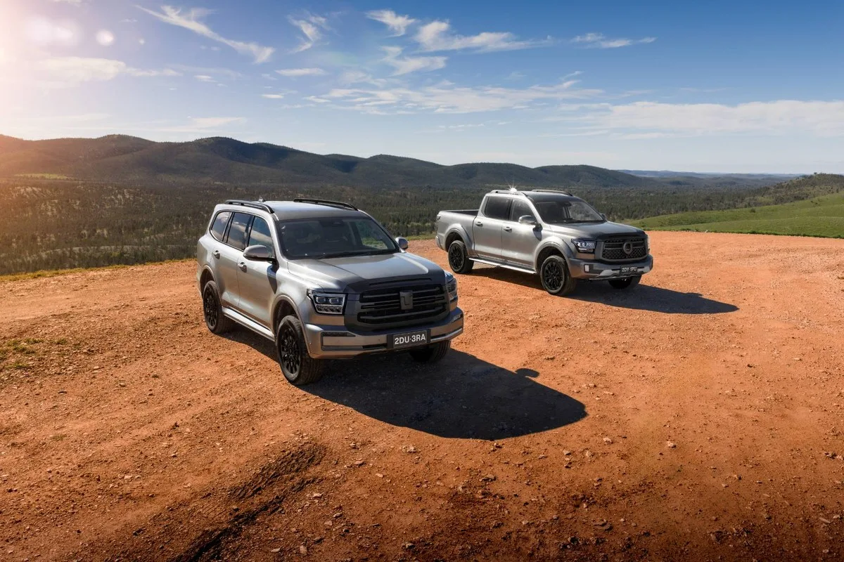 GWM Tank 500 SUV and Cannon Alpha ute parked together on red dirt