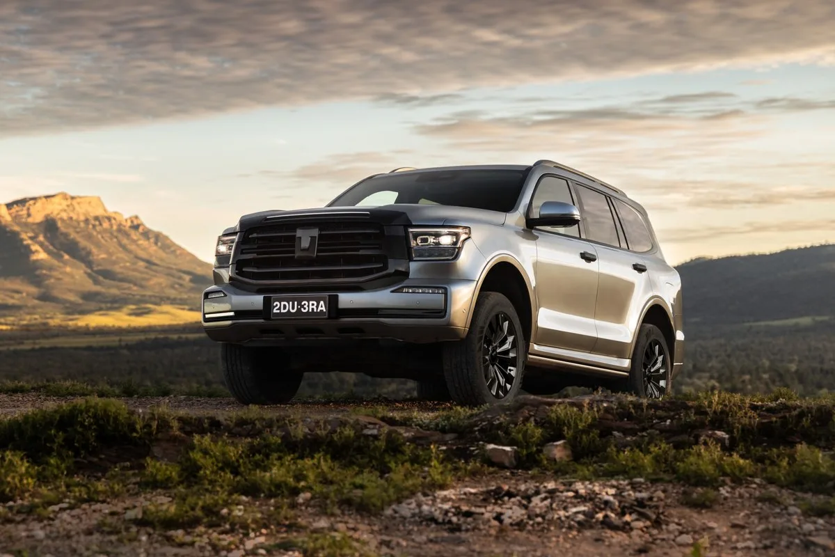 Silver GWM Tank 500 Vanta with black grille parked at sunset