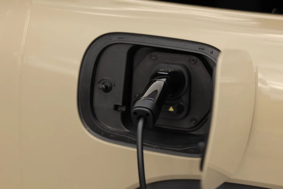 Charging cable plugged into the GWM Tank 300 Ultra Hi4-T charge port