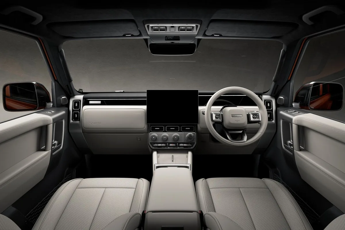 iCAUR V25 dashboard in cream with a centre screen and physical climate controls below it