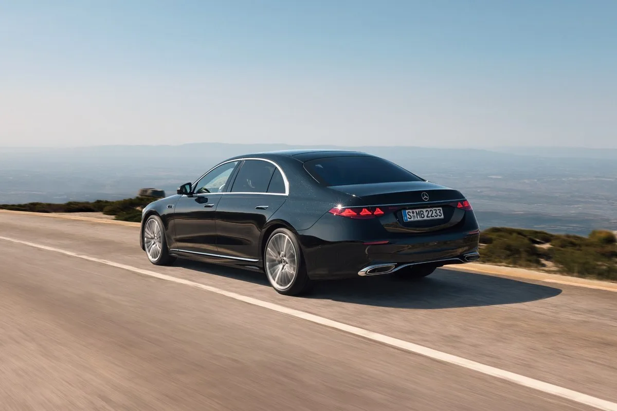 2026 Mercedes-Benz S-Class rear three-quarter view showing the redesigned tail lamp graphics
