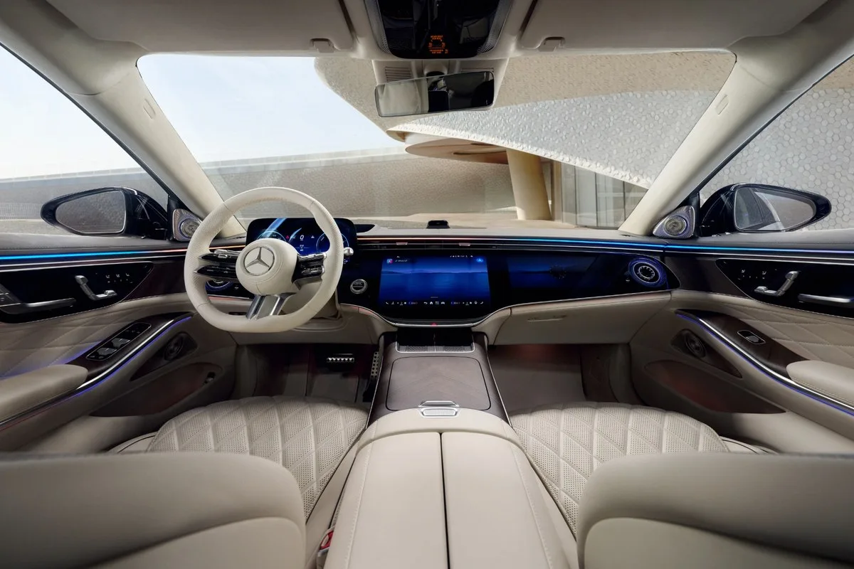 2026 Mercedes-Benz S-Class cabin showing the 14.4-inch central touchscreen and 12.3-inch instrument cluster