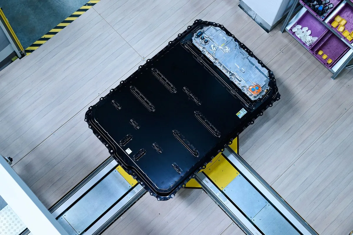 BMW Gen6 high-voltage battery pack seen from above on an assembly line