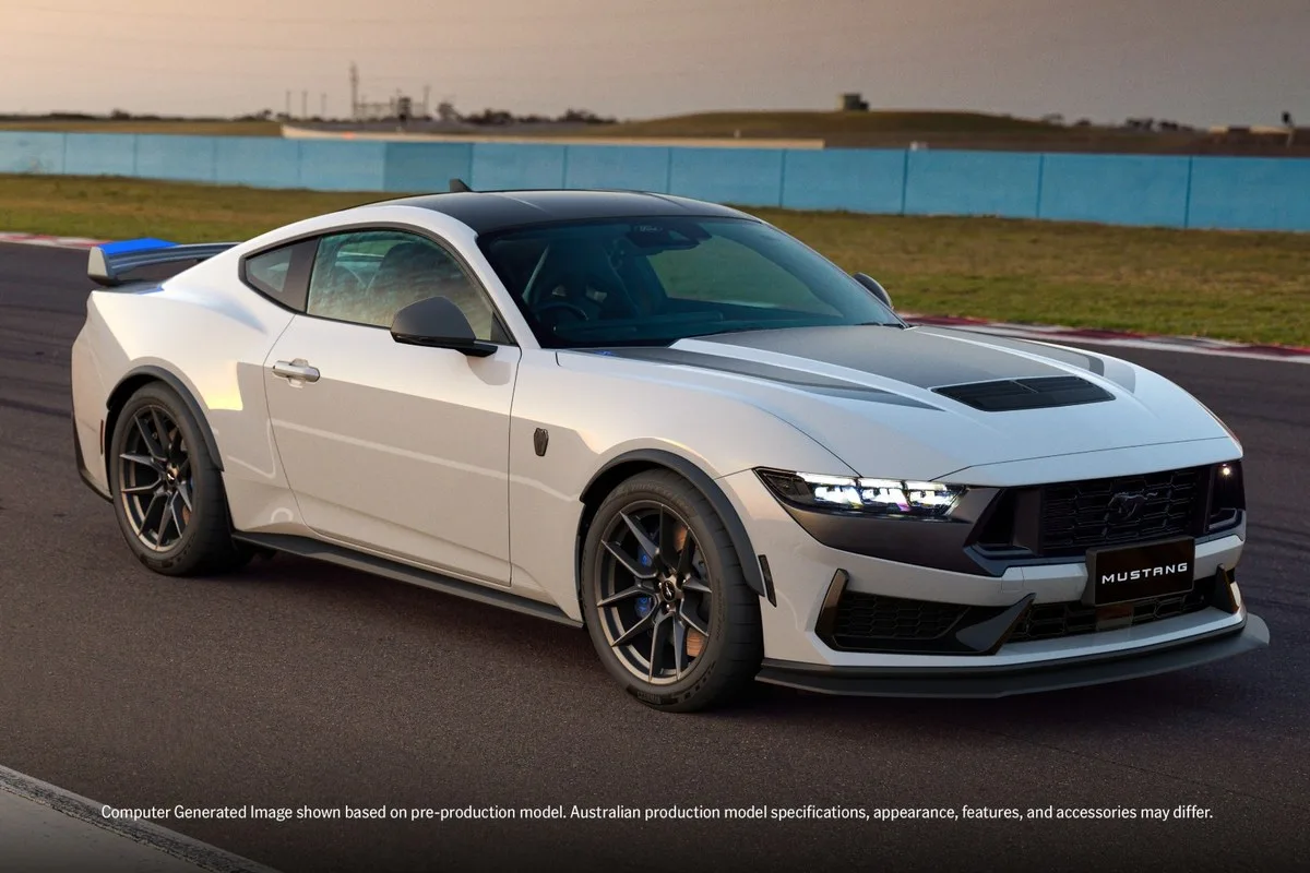 Ford Mustang Dark Horse T8-Spec pack front three-quarter on a circuit